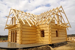 Строительство домов из бруса: положительные стороны использования данного стройматериала 